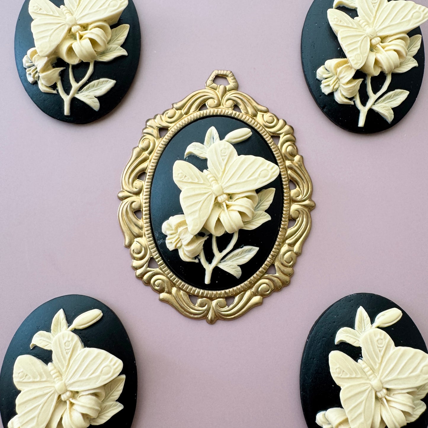 Plastic Cameo Butterfly on Flower Black 40×30mm