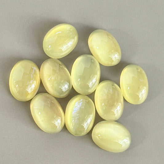 Dragons Breath (mexican opal) smooth top / flat back cabochon yellow oval 14x10mm