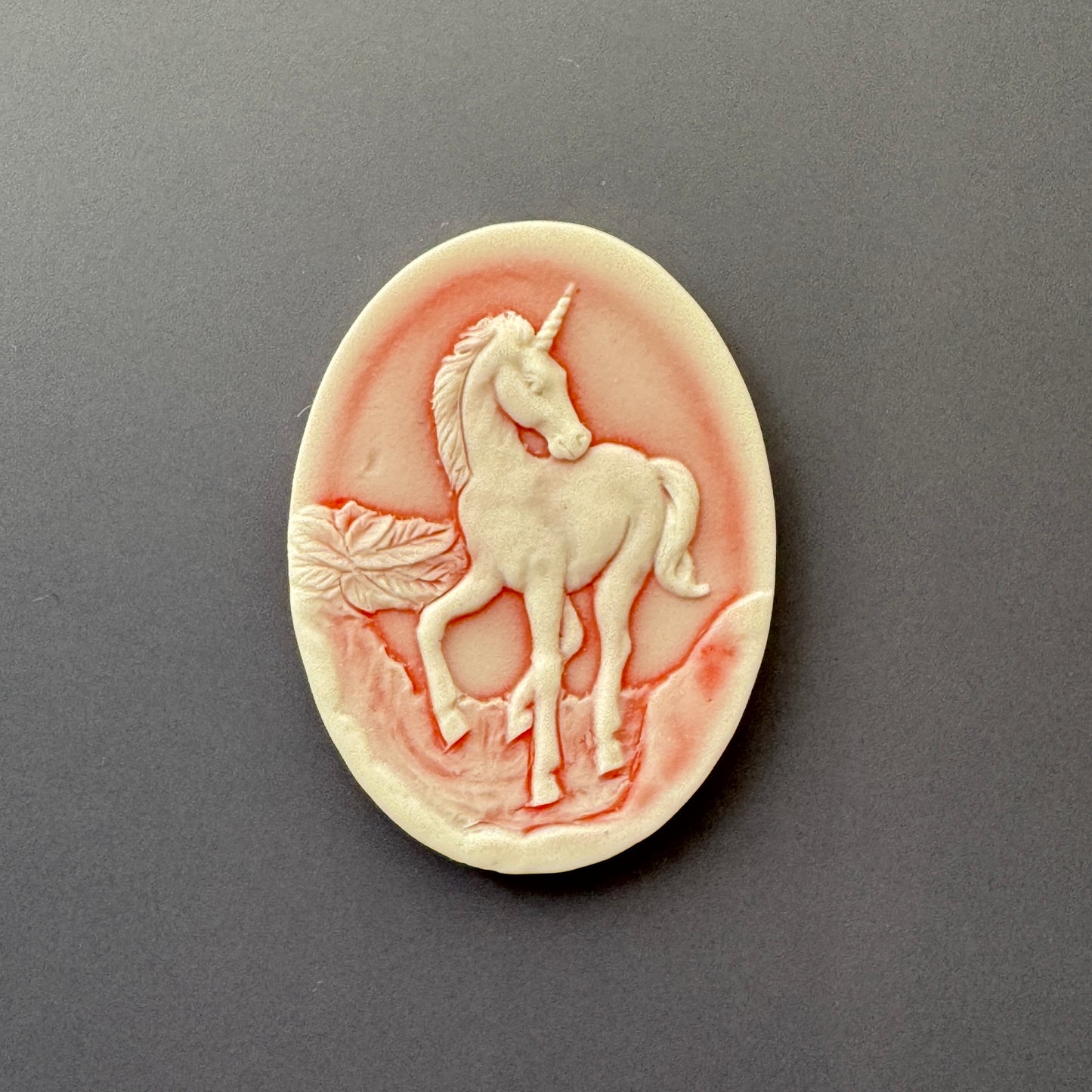 Plastic Cameo Unicorn Orange 40x30mm