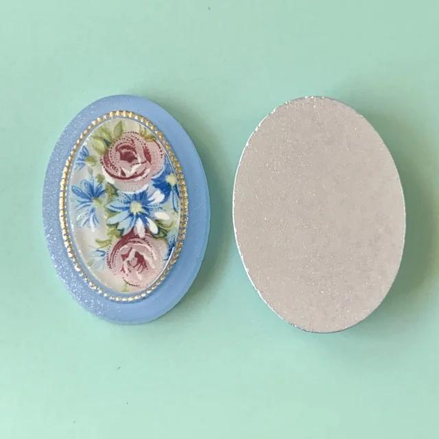 W.Germany Plastic Cameo Flower Blue 25x18mm